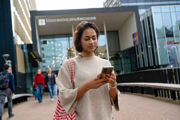 Student with mobile phone