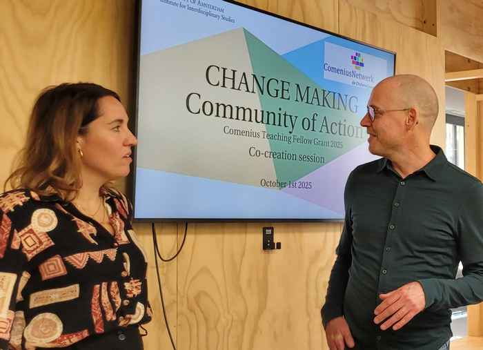 Foto van Tjerk Jan en Debby voor een digibord